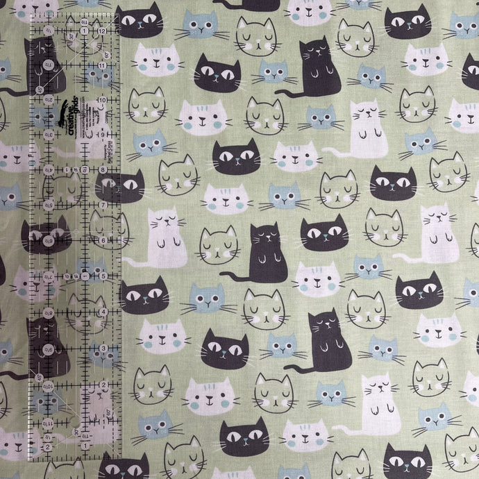 Green Stylised Cats Fabric